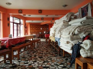 A stack of duvets for anyone who felt extra cold. I took one since just blankets wouldn't have done it for me