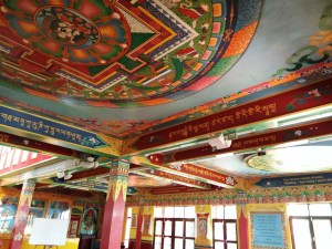 The entire gompa is covered in thangkas depicting various Buddhist themes. It was a very bright and colorful room