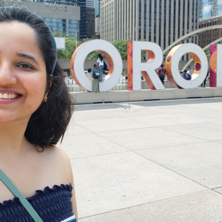 With the Toronto sign