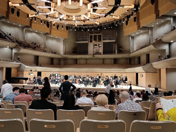 The view from the audience seats. The pre-concert audience seats can be seen behind the orchestra. Clicking pictures is not allowed during the show. I clicked this one in the intermission.