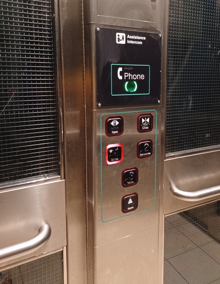 In case assistance is required while in the elevator, the "Phone" button can be pressed to talk to an assistant. If you notice carefully, all the instructions are also written in Braille.